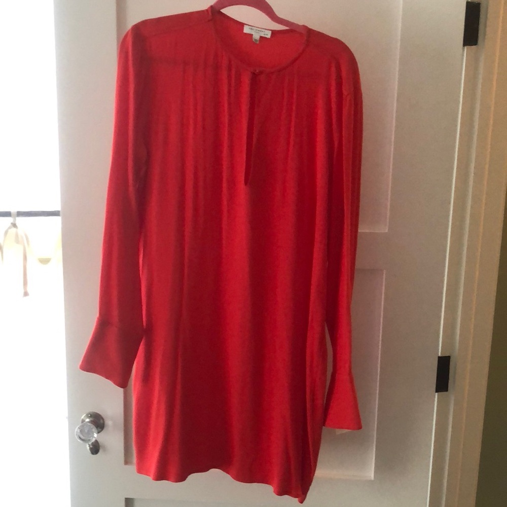 RED!!!  occasionally we all need something RED to wear. Equipment brand in XL.